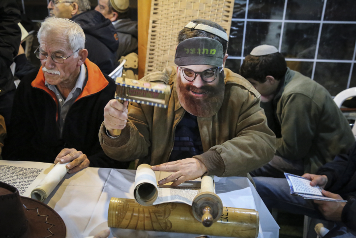A man dressed up as Naftali Bennett in one of his campaign ads, at the Oz VeGaon outpost in Gush Etzion. March 4, 2015. (photo credit: Gershon Elinson/Flash90) A man dressed up as Naftali Bennett in one of his campaign ads, at the Oz VeGaon outpost in Gush Etzion. March 4, 2015. (photo credit: Gershon Elinson/Flash90)