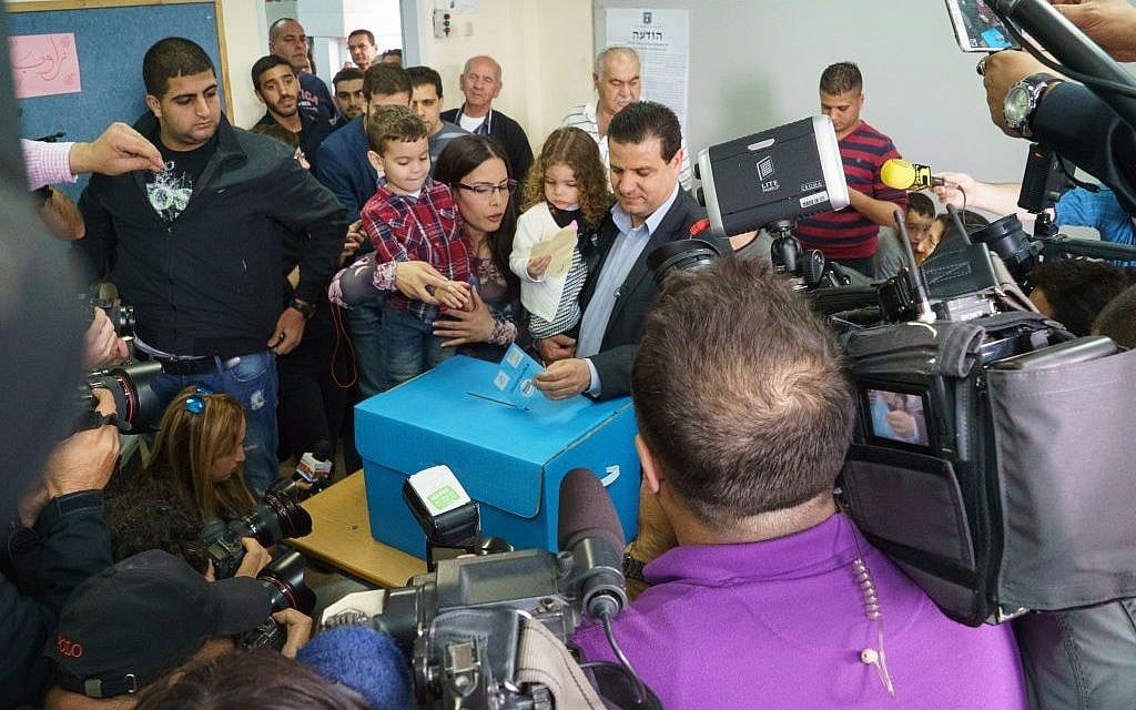 Joint List head Ayman Odeh voting in Nazareth on March 17, 2015. (Photo credit: Basal Awidat/Flash90)