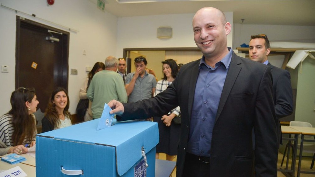 Economy Minister Naftali Bennett, leader of the Jewish Home party, casts his vote in general elections in in Ra’anana, March 17, 2015. (photo credit: Flash90) Economy Minister Naftali Bennett, leader of the Jewish Home party, casts his vote in general elections in in Ra’anana, March 17, 2015. (photo credit: Flash90)