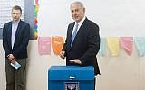 Prime Minister Benjamin Netanyahu casts his vote at a polling station in Jerusalem on March 17, 2015. (Photo credit: Marc israel Sellem/POOL/FLASH90)
