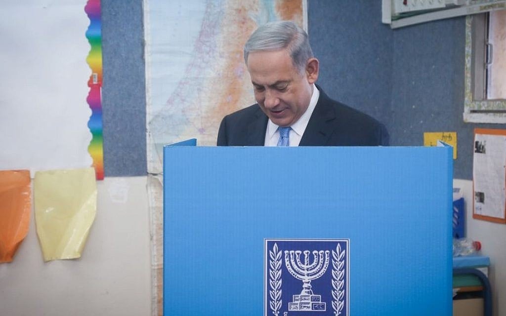 Israeli Prime Minister Benjamin Netanyahu casts his vote at a polling station in Jerusalem on March 17, 2015. Photo credit: Marc israel Sellem/POOL/FLASH90)