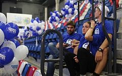 Supporters of the Zionist Union react as the exit polls in the Israeli general elections for the 20th parliament are announced on March 17, 2015. (Photo credit: Hadas Parush/FLASH90)