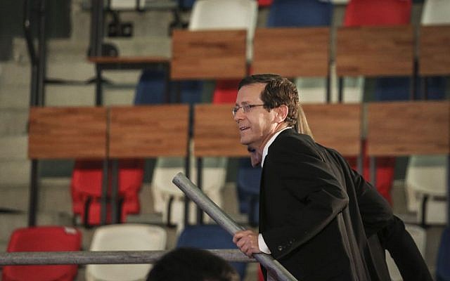 Zionist Union head Isaac Herzog, walks onto the stage at the party's headquarters in Tel Aviv, after the exit polls in the Israeli general elections for the 20th parliament were announced on March 17, 2015. (Photo credit: Hadas Parush/FLASH90) Zionist Union head Isaac Herzog, walks onto the stage at the party's headquarters in Tel Aviv, after the exit polls in the Israeli general elections for the 20th parliament were announced on March 17, 2015. (Photo credit: Hadas Parush/FLASH90)