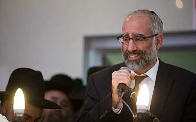 Gabriel Sassoon at the funeral of his seven children in Jerusalem on March 23, 2015. (photo credit: Yonatan Sindel/Flash90)