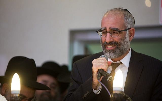 Gabriel Sassoon at the funeral of his seven children in Jerusalem on March 23, 2015. (photo credit: Yonatan Sindel/Flash90) Gabriel Sassoon at the funeral of his seven children in Jerusalem on March 23, 2015. (photo credit: Yonatan Sindel/Flash90)