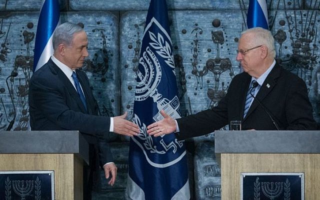 Prime Minister Benjamin Netanyahu meets with President Reuven Rivlin in a ceremony tasking Netanyahu to form the next Israeli government, at the president's residence in Jerusalem on March 25, 2015. (Photo credit: Miriam Alster/Flash90)