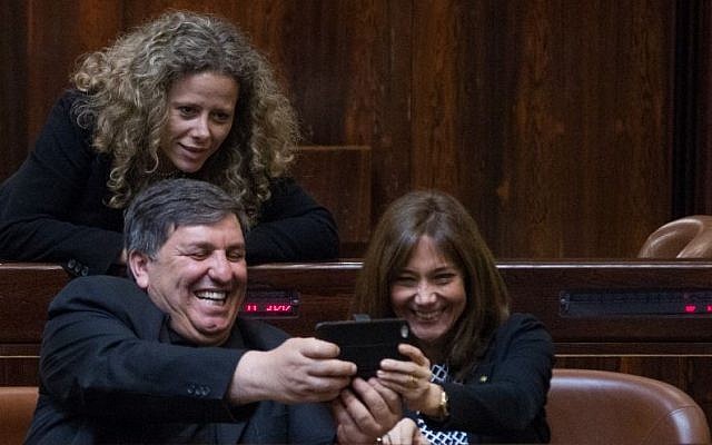 New MKs Dani Atar (L), Revital Swid and Ayelet Nachmias Verbin of the Zionist Union party seen in the plenum hall of the Knesset on March 29, 2015. (photo credit: Miriam Alster/FLASH90)