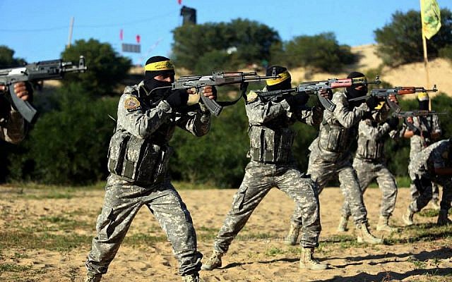 Masked Fatah operatives practice military skills during a drill in Gaza, March 6, 2015. (photo credit: Facebook) Masked Fatah operatives practice military skills during a drill in Gaza, March 6, 2015. (photo credit: Facebook)