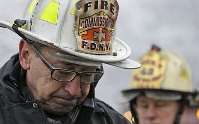New York's Fire Commissioner Daniel Nigro describes the fire to reporters during a news conference, Saturday, March 21, 2015, in the Brooklyn borough of New York, Saturday, March 21, 2015. (photo credit: AP/Mary Altaffer)