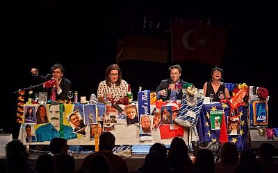 In this Saturday, March 7, 2015 photo Denis Yucel, Ebru Tasdemir, Yassin Musharbash and Mely Kiyak, from left, read from letters-to-the-editor during the 'Hate Poetry' show in the Theaterlabor in Bielefeld, Germany. (photo credit: AP Photo/Oliver Krato)