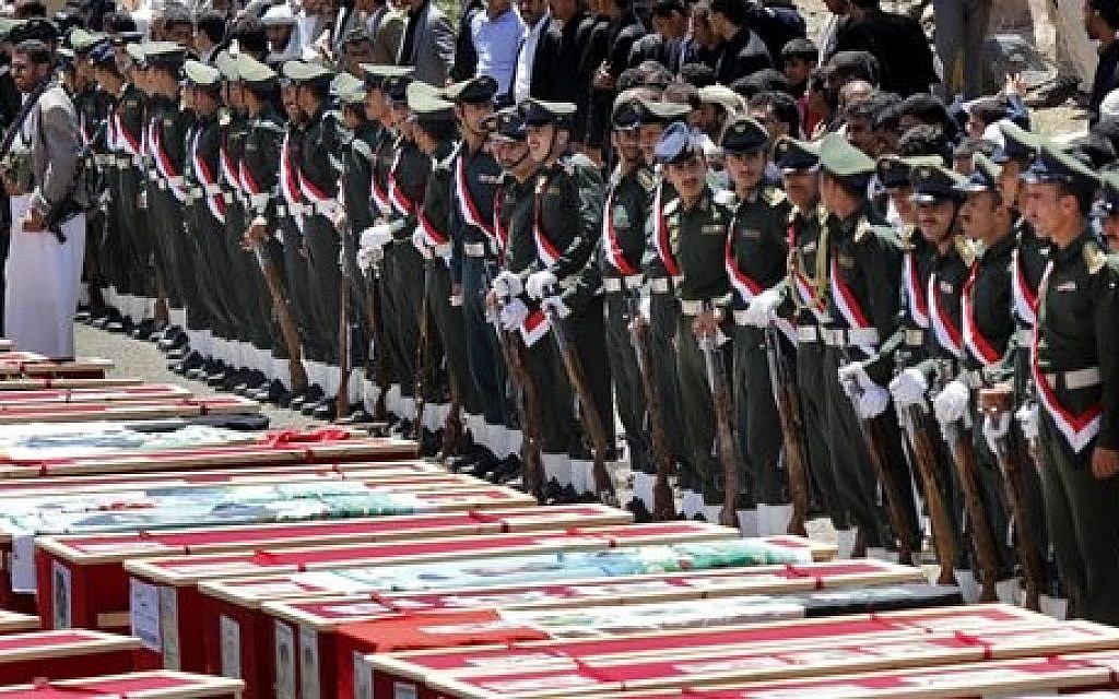 Houthi Shiite mourners attend the funeral procession of victims who were killed last week from triple suicide bombing attacks that hit a pair of mosques in Sanaa, Yemen, Wednesday, March 25, 2015. (photo credit: AP Photo/Hani Mohammed)
