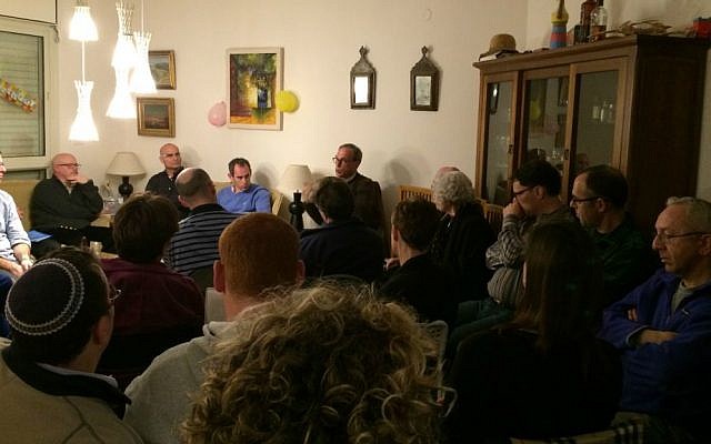 Nachman Shai speaks at Zionist Union parlor meeting for English-speakers in Modiin. February 28, 2015. (photo credit: Renee Ghert-Zand/TOI)