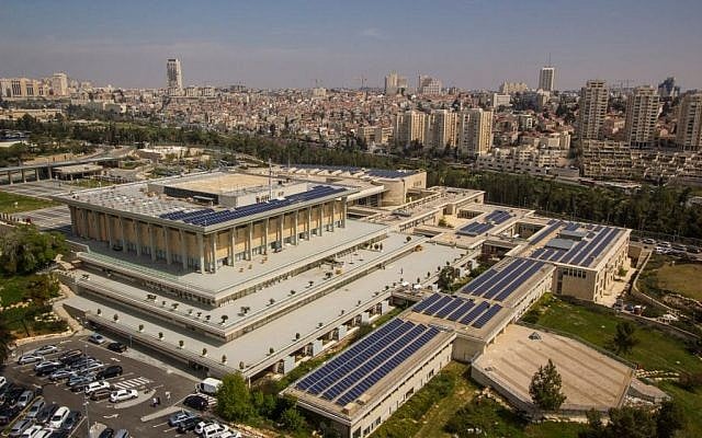 An aerial view of the Knesset showcasing the solar panels on its roof and on adjacent buildings. The panels will be able to produce up to a third of the Knesset's energy consumption. (Courtesy: Knesset)
