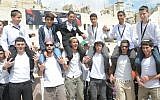 Boys who have been orphaned celebrate their bar mitzva together at the Western Wall in an event organized by Colel Chabad (Photo credit: Kobi Amsalem)