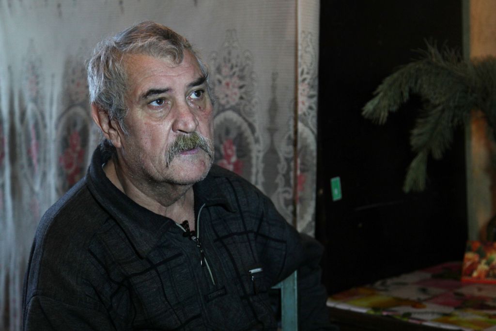 In Artemovsk, homebound pensioner Leonid Annov, 67, lives with his wife and grandson in an uninsulated apartment in eastern Ukraine. (courtesy JDC) In Artemovsk, homebound pensioner Leonid Annov, 67, lives with his wife and grandson in an uninsulated apartment in eastern Ukraine. (courtesy JDC)