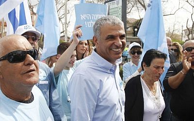 Moshe Kahlon, head of the Kulanu party, returns to his hometown of Givat Olga Tuesday Mar. 17, 2015 to accompany his mother to the voting booth. (Photo credit: Judah Ari Gross/Times of Israel) Moshe Kahlon, head of the Kulanu party, returns to his hometown of Givat Olga Tuesday Mar. 17, 2015 to accompany his mother to the voting booth. (Photo credit: Judah Ari Gross/Times of Israel)