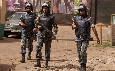 The nightclub, rear, that was attacked by gunmen as armed forces provide security in Bamako, Mali, Saturday, March 7, 2015.  (Photo credit: AP /Harouna Traore)