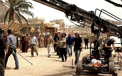 Iranian filmmaker Majid Majidi, center, director of “Muhammad, Messenger of God” movie. conducts a scene of the movie, in Allahyar village 43 miles (70 kilometers) south of the capital Tehran, Iran. In Islam, portraying the Prophet Muhammad has long been taboo for many. In the new 190-minute film, the story focuses on Muhammad’s childhood, never showing his face. The movie instead focuses on others to tell his story. (photo credit: AP Photo/Nourtaban Film Industry, Mohammad Foghani)
