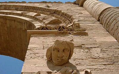In this July 27, 2005 file photo, the face of a woman stares down at visitors in the Hatra ruins, 320 kilometers (200 miles) north of Baghdad, Iraq. Iraq's minister of tourism and antiquities told The Associated Press, Saturday, March 7, 2015, that the government is investigating reports that the ancient archaeological site of Hatra in northwestern Iraq is being demolished by militants from the Islamic State group (photo credit: AP Photo/Antonio Castaneda)