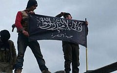 Illustrative photo of rebels from the al-Qaeda-affiliated al-Nusra Front in Idlib Province, northern Syria, January 11, 2013 (AP/Edlib News Network ENN)