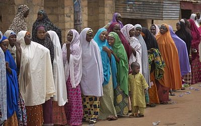 Nigerian women queue, while they face long delays to cast their vote in the afternoon at a polling station in Daura, the home town of opposition candidate Gen. Muhammadu Buhari, in northern Nigeria Saturday, March 28, 2015. (photo credit: AP/Ben Curtis) 