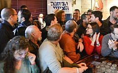 Tzipi Livni (center) meets young English-speaking Israeli voters in a Tel Aviv bar. February 17, 2015. (photo credit: Louiz Green)