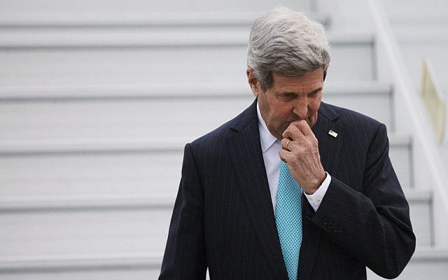 U.S. Secretary of State John Kerry disembarks from his plane as he arrives in Geneva, Switzerland, Sunday March 15, 2015. (Photo credit: AP/Brian Snyder, pool)