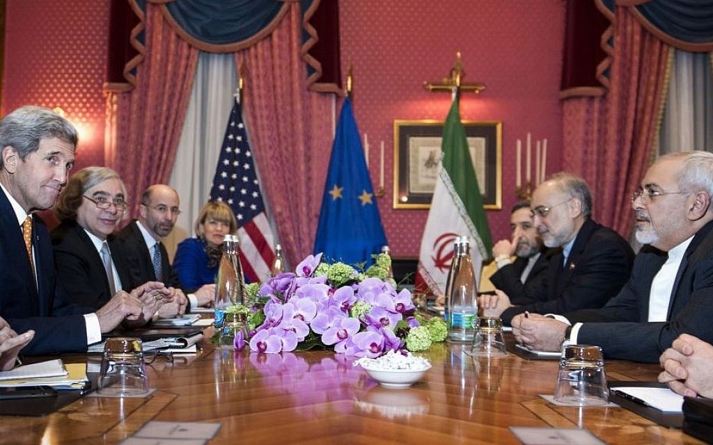 US Secretary of State John Kerry, (L) and Iranian Foreign Minister Mohammad Javad Zarif (R) wait for the start of a meeting for nuclear talks a hotel in Lausanne Switzerland, March 26, 2015. (photo credit: AP/Brendan Smialowski, Pool) US Secretary of State John Kerry, (L) and Iranian Foreign Minister Mohammad Javad Zarif (R) wait for the start of a meeting for nuclear talks a hotel in Lausanne Switzerland, March 26, 2015. (photo credit: AP/Brendan Smialowski, Pool)