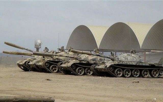 In this photo taken Tuesday, March 24, 2015, tanks seized recently by militiamen loyal to Yemen's President Abed Rabbo Mansour Hadi take positions at the al-Anad air base in the southern province of Lahej, 60 kilometers (35 miles) north of Aden, Yemen. (photo credit: AP Photo/Wael Qubady) In this photo taken Tuesday, March 24, 2015, tanks seized recently by militiamen loyal to Yemen's President Abed Rabbo Mansour Hadi take positions at the al-Anad air base in the southern province of Lahej, 60 kilometers (35 miles) north of Aden, Yemen. (photo credit: AP Photo/Wael Qubady)