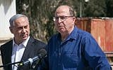 Defense Minister Moshe Ya'alon alongside Prime Minister Benjamin Netanyahu at an IDF base on March 10, 2015. (Ohad Zwigenberg)