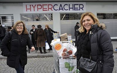 Shoppers outside the Hyper Cacher market near Paris, where four people were murdered in January. The shop reopened on March 15, 2015. (Serge Attal/Flash90/JTA)