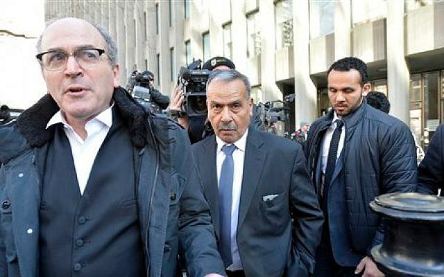 Mohammed Jaser, centre, father of Raed Jaser, leaves court after two men accused of plotting to attack a Via Rail passenger train travelling from New York to Toronto were found guilty of terror-related charges in Toronto on Friday, March 20, 2015. (photo credit: AP/The Canadian Press, Nathan Denette)