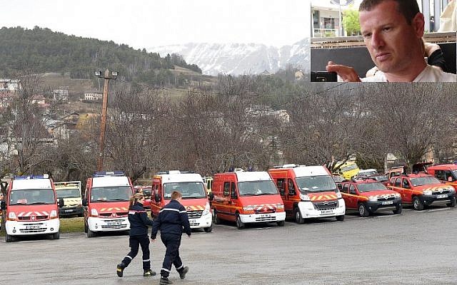 Emergency vehicles are parked on March 24, 2015 in the southeastern French town of Seyne les Alpes after a German Airbus A320 of the low-cost carrier Germanwings passenger plane crashed, killing all 150 people on board. Inset: Eyal Baum. (photo credits: AFP/BORIS HORVAT and Facebook) Emergency vehicles are parked on March 24, 2015 in the southeastern French town of Seyne les Alpes after a German Airbus A320 of the low-cost carrier Germanwings passenger plane crashed, killing all 150 people on board. Inset: Eyal Baum. (photo credits: AFP/BORIS HORVAT and Facebook)