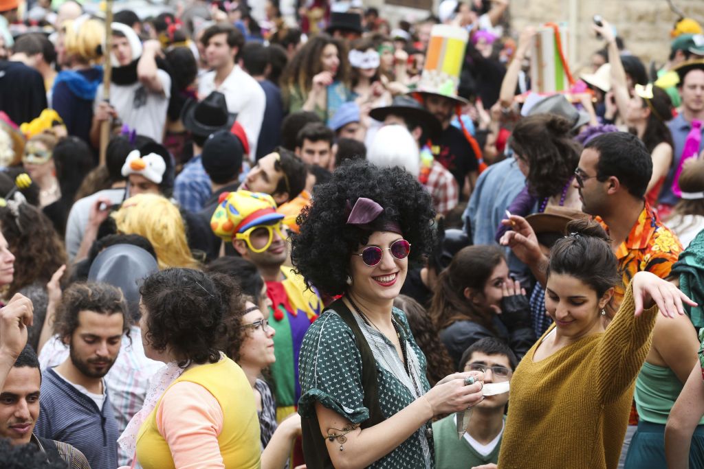 At the annual Purim street party in Jerusalem's Nachlaot neighborhood (photo credit: Nati Shochat/Flash 90)