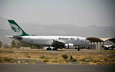 A plane from the Iranian private airline Mahan Air lands the international airport in Sanaa, Yemen, Sunday, March 1, 2015 (AP Photo/Hani Mohammed)