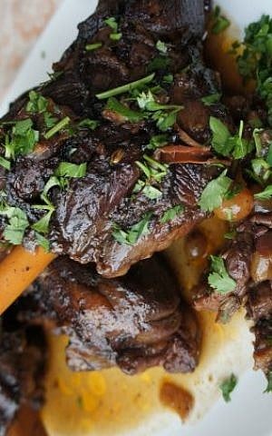Tired of brisket? Try these Braised Lamb Shanks with Dates and Raisins. (Shannon Sarna/JTA)
