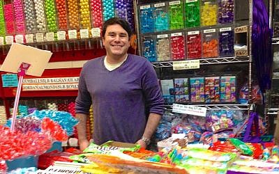Mitchell Cohen at Economy Candy on New York's Lower East Side. (photo credit; Debra Nussbaum Cohen/JTA)