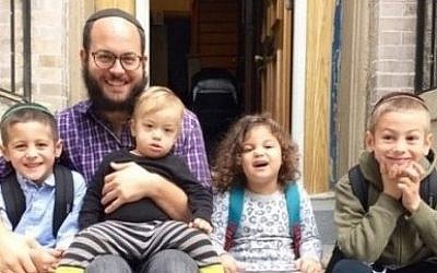 Nadiv Kehaty with his four children, who are all under the age of 7 (Photo credit: JTA/Courtesy of Charidy.com)