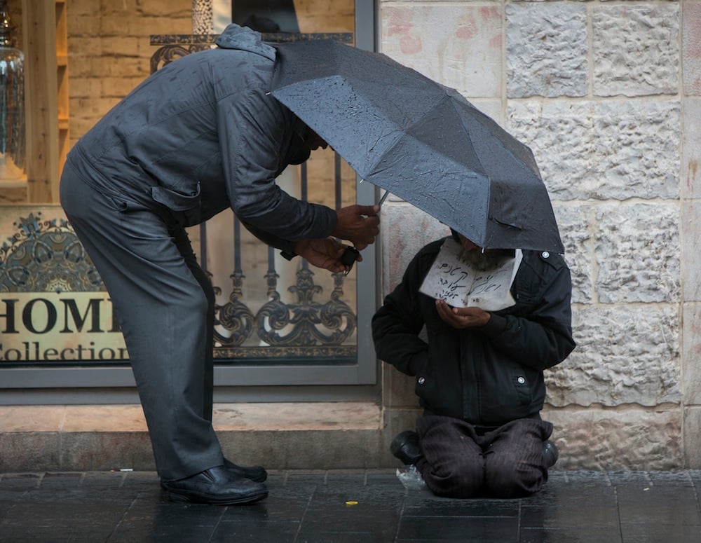 A homeless man in Jerusalem. Under Prime Minister Benjamin Netanyahu, Israel has emerged as one of the developed world’s most economically unequal countries. (photo credit: Yonatan Sindel/Flash90) A homeless man in Jerusalem. Under Prime Minister Benjamin Netanyahu, Israel has emerged as one of the developed world’s most economically unequal countries. (photo credit: Yonatan Sindel/Flash90)