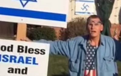 Robert Dixon protesting against the installation (photo credit: YouTube screen capture)