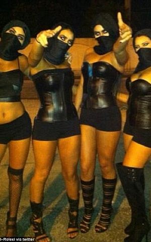 A group of US women dress up as "sexy" Islamic State members for Halloween, October 2014. (Photo credit: ArmoQueenn/Twitter)