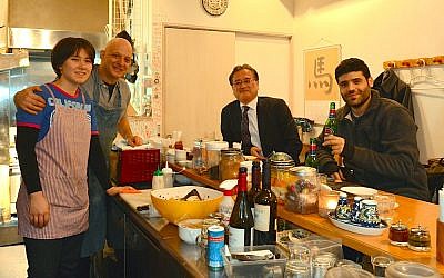Dan Zuckerman, second from left, at his Tokyo restaurant Ta-im, Dec. 24, 2015. (Cnaan Liphshiz/JTA)