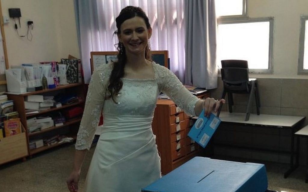 Tamar Kirsch of Ginot Shomron stops off to vote on the way to her wedding, March 17, 2015. (photo credit: Z. S. Lebetkin)