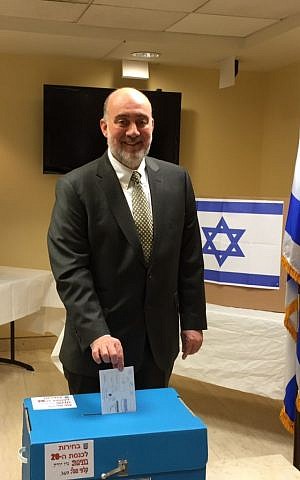 Israel's Ambassador to the UN Ron Prosor casts his ballot in New York City on March 5, 2015. (photo credit: Permanent Mission of Israel to the UN)