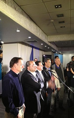 Arab Joint List candidates face the crowd at a post-election event in Umm Al-Fahm, Tuesday, March 17, 2015 (photo credit: Elhanan Miller/Times of Israel)