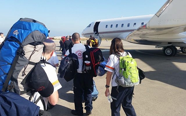 Medical workers with Magen David Adom board a plane to Kathmandu on Sunday morning at the Sde Dov Airport in Tel Aviv (photo courtesy Magen David Adom)