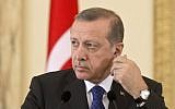 Illustrative: Turkish President Recep Tayyip Erdogan attends a news conference during a meeting with Romania's President at the Cotroceni Palace in Bucharest on April 1, 2015. (AFP PHOTO / DANIEL MIHAILESCU)