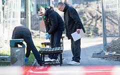 Police investigate near the Franciscan Monastery in Berlin on April 5, 2015, where the body of Israeli Yosi Damari was found. (AFP/DPA/Maurizio Gambarini)