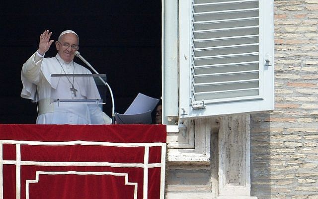 Pope Francis addresses the crowd from the window of the apostolic palace overlooking St.Peter's square during the Regina Coeli prayer on April 19, 2015 at the Vatican. (photo credit: AFP PHOTO / TIZIANA FABI) Pope Francis addresses the crowd from the window of the apostolic palace overlooking St.Peter's square during the Regina Coeli prayer on April 19, 2015 at the Vatican. (photo credit: AFP PHOTO / TIZIANA FABI)
