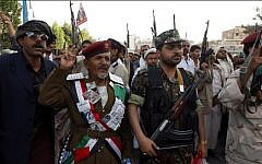 Supporters of the Shiite Houthi movement shout anti-Saudi slogans during a demonstration in Sana'a on April 10, 2015. (photo credit: AFP/Mohammed Huwais)